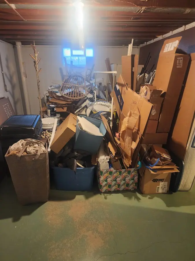 Roll-off dumpster container at job site for 2 Yard Dumpster Rental in Blackfoot